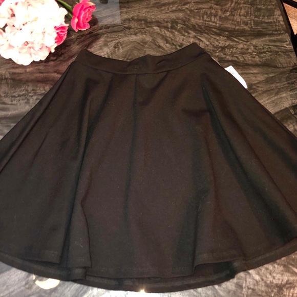 Charlotte Russe Dresses & Skirts - Black flowy Mini Skirt Charlotte Russe Dresses & Skirts - Black flowy Mini Skirt